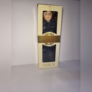 Porcelain Doll in Navy Coat